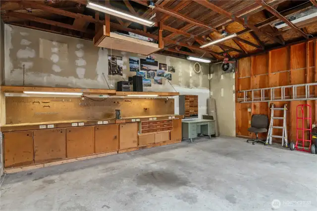 Lots of storage space here... pull down attic stairs for more storage.