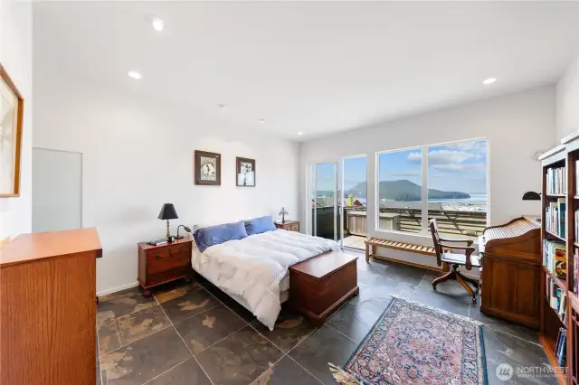 Primary suite with access to deck for those quiet mornings with coffee