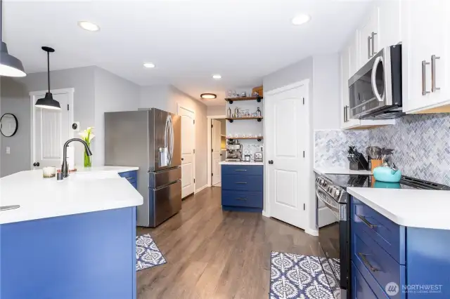 Updated Kitchen, with farm sink and quartz countertops