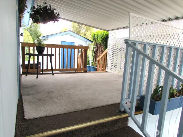 Semi- private covered deck off back door area.