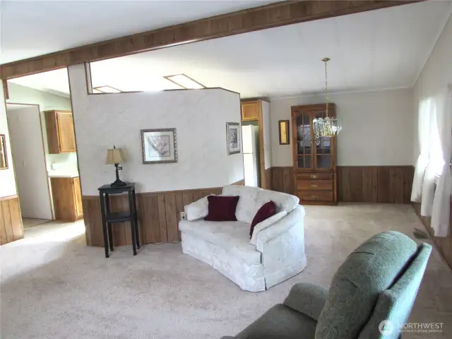 Dining room area with Kitchen access to left.