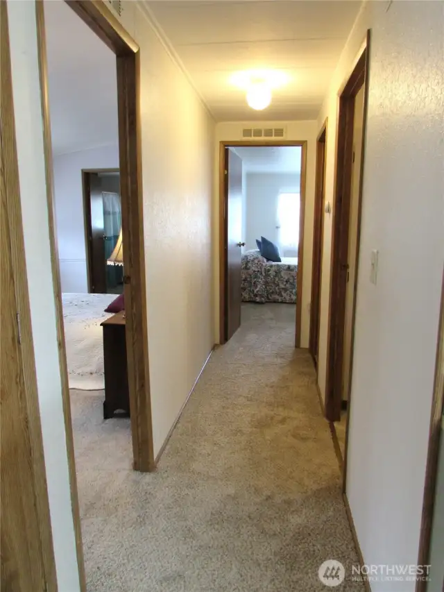 Hallway to Bedrooms/ baths & utility room.