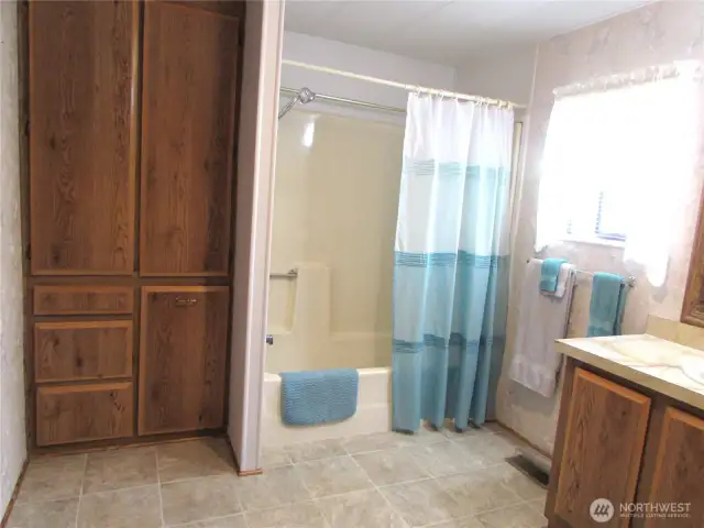 Master bath w/ tub/shower & more storage comparments.