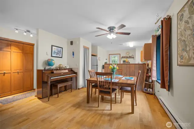 Spacious dining area with ceiling fan