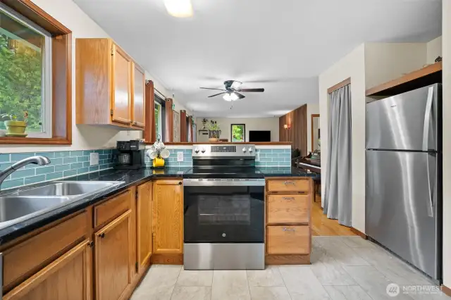Beautiful tile backsplash adds a pop of color