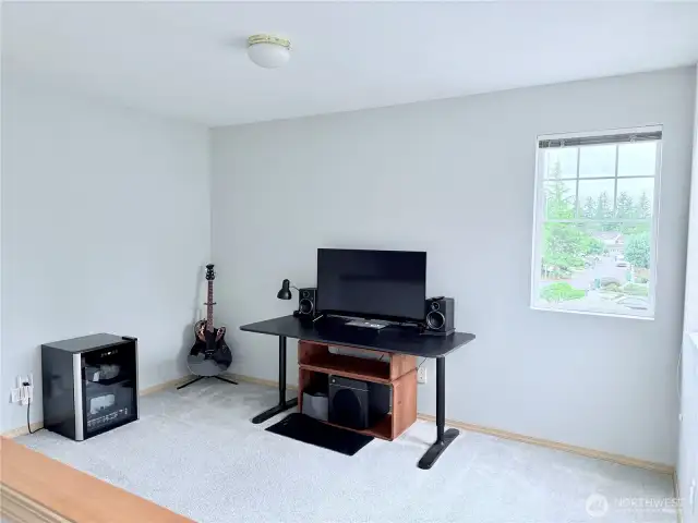 Upstairs loft with additional living space and view of the Olympic Mountains
