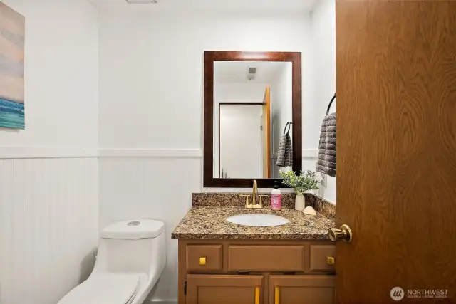 Powder room off of family room.