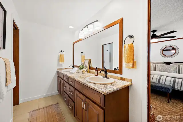 A long vanity with double sinks ensures plenty of room to get ready for the day.
