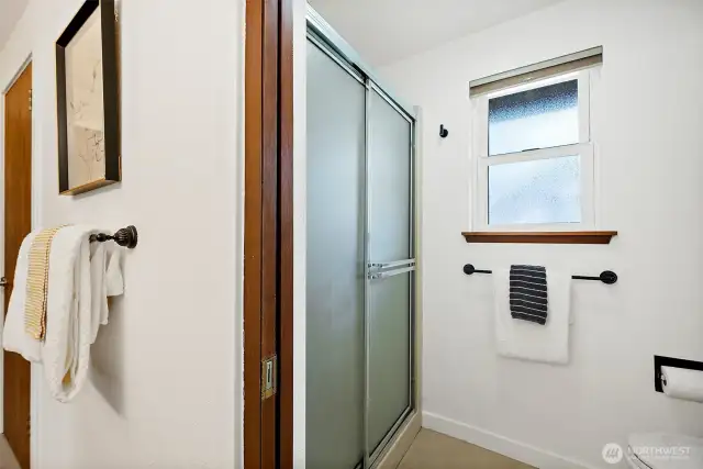 The primary bathroom includes a separate walk-in shower and toilet room.