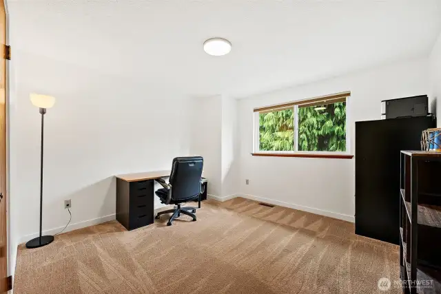 The third bedroom is currently being used as an office.