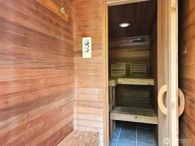 The sauna interior is made of cedar and it can be a dry or steam sauna.