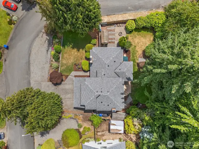 The large corner lot is beautifully landscaped.