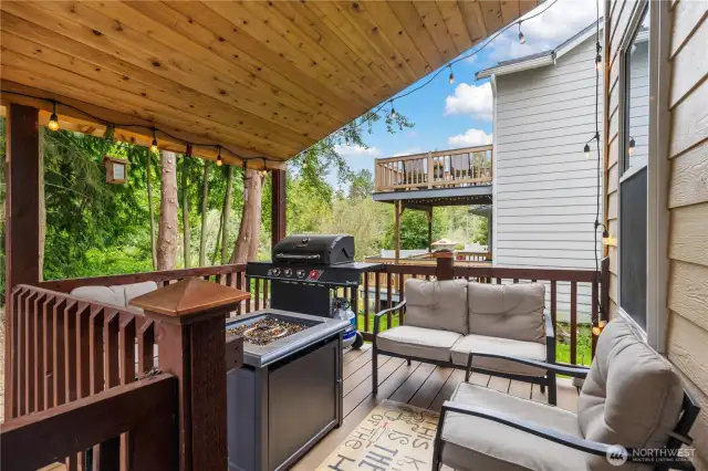 Beautiful covered deck is perfect for grilling or just relaxing.