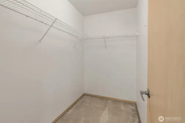 Primary walk-in closet.