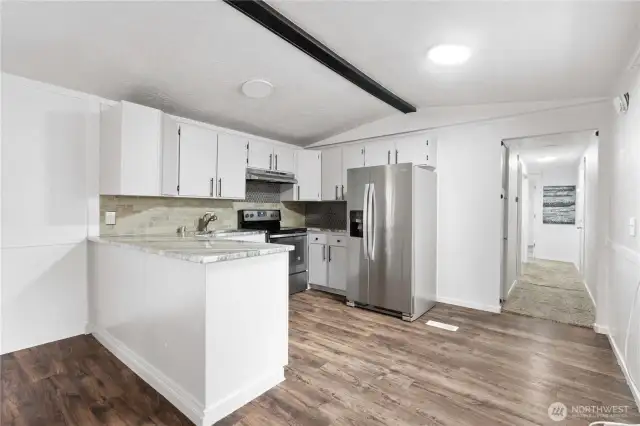 Beautiful kitchen with granite countertops and SS Appliances.