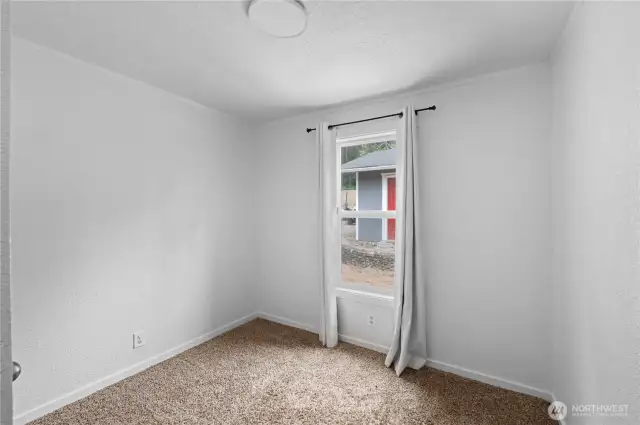 This is the smallest of three bedrooms, could be a nursery, office, tv room, whatever you would like.