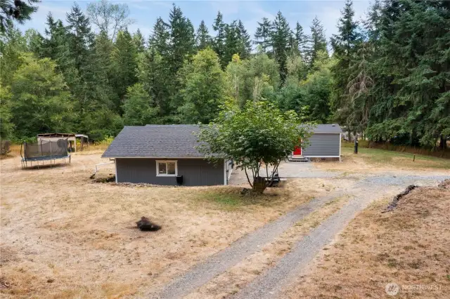 The home sits on a gentle slope that can be terraced more than it already is. There is room for Rvs, boats, toys, whatever you would like when you don't have an HOA.