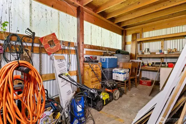 Appreciate an additional workshop built onto the back of the detached garage.