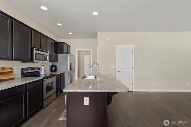 The door at back wall leads to large understair storage.