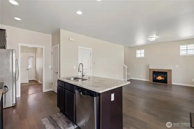 Overlooking kitchen island to the spacious living space.