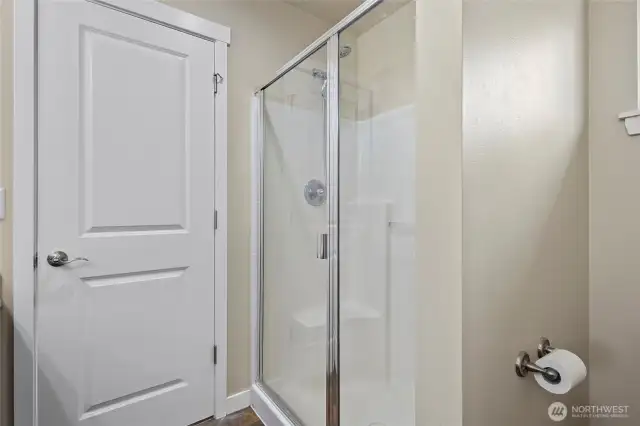 Shower stall in ensuite primary bathroom