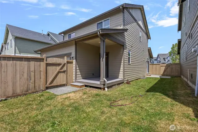 Another view of the fenced yard