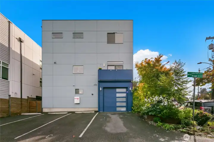This townhouse is on the end. All windows belong to it as well as the attached garage and parking pad