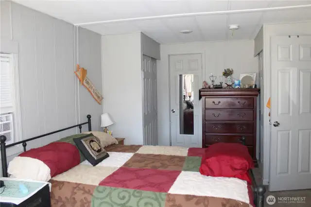 Primary bedroom has two closets.