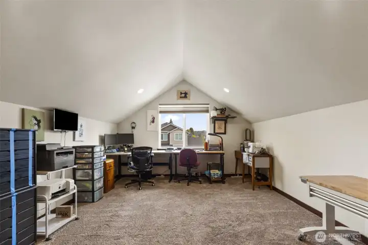Upstairs bonus room with walk-in closet