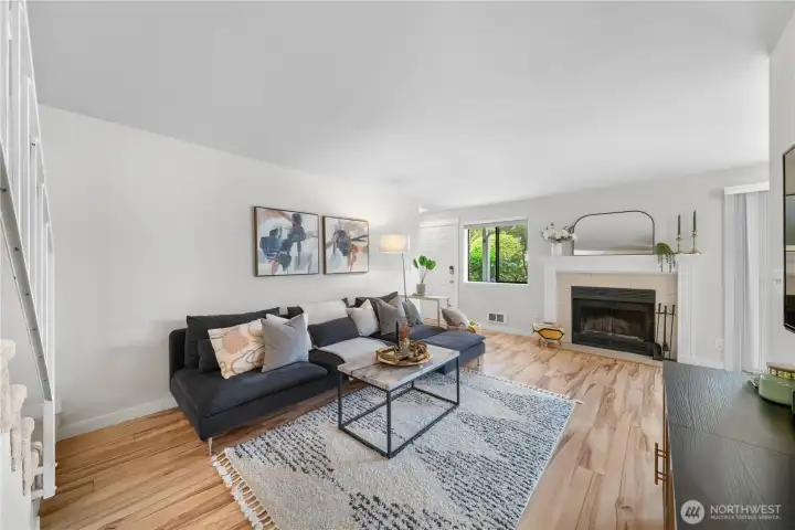 Delightful centerpiece wood burning fireplace.