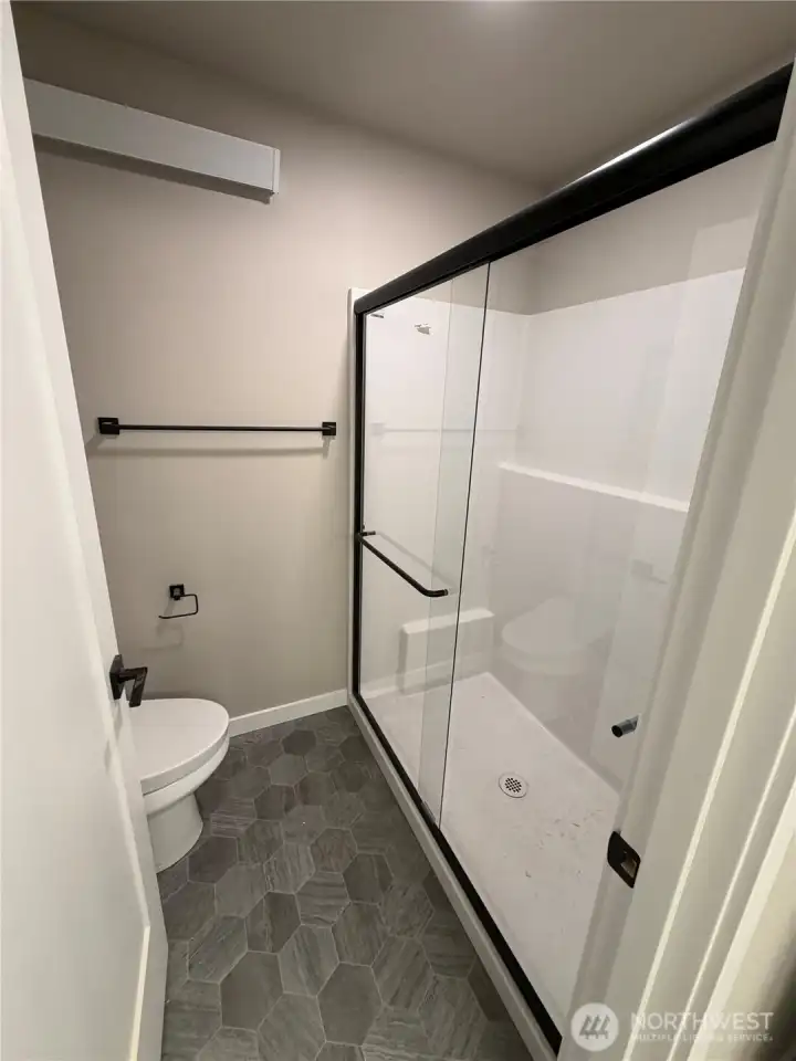 Upstairs primary bedroom ensuite with private lav & large walk-in shower