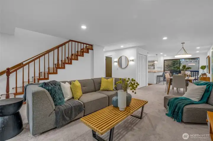 Such a great space to entertain friends.  Open concept allows flow and function. Can lighting makes the space feel open and inviting. New carpet and interior paint.