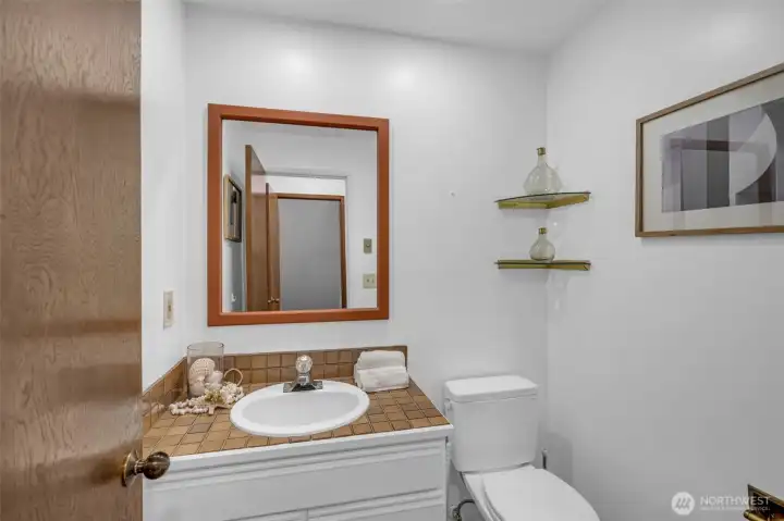 Powder room on the main level makes it convenience for you and your guests.