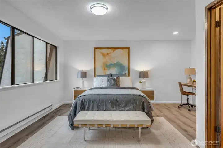 The primary bedroom faces west and get lots of natural light. Luxury vinyl plank flooring, new base molding and lighting.  Attached three quarter bath with walk in shower.  The two upper bedrooms are generously sized with room for desks or sitting areas.