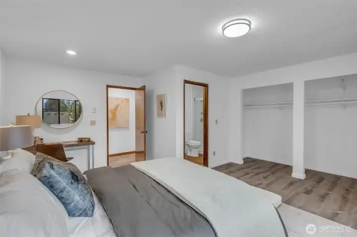 The primary bedroom faces west and get lots of natural light. Luxury vinyl plank flooring, new base molding and lighting.  Attached three quarter bath with walk in shower.  The two upper bedrooms are generously sized with room for desks or sitting areas.  Side by side double closets.