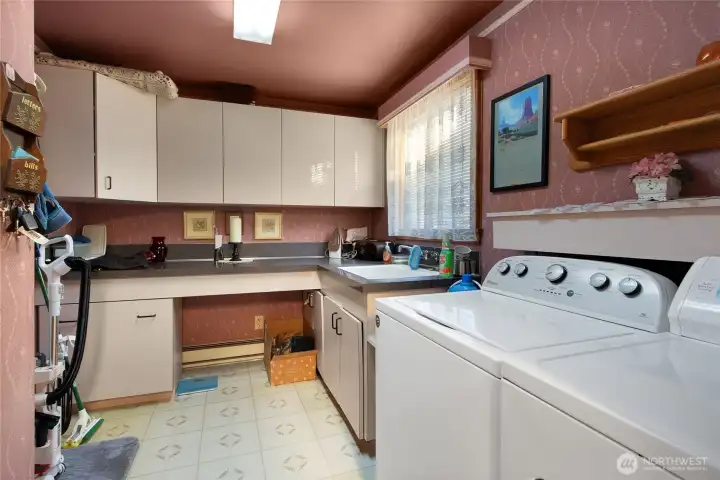 Big Laundry Room With Sink and Pantry.