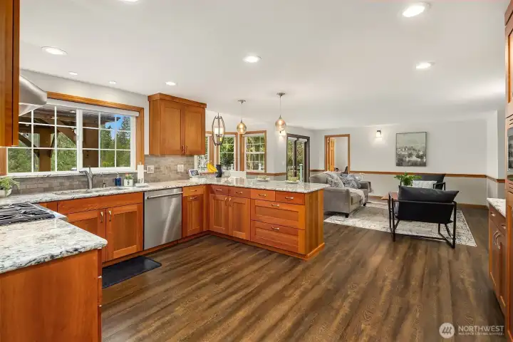 Full kitchen remodel with natural cherry cabinetry, granite counters and all the bells and whistles