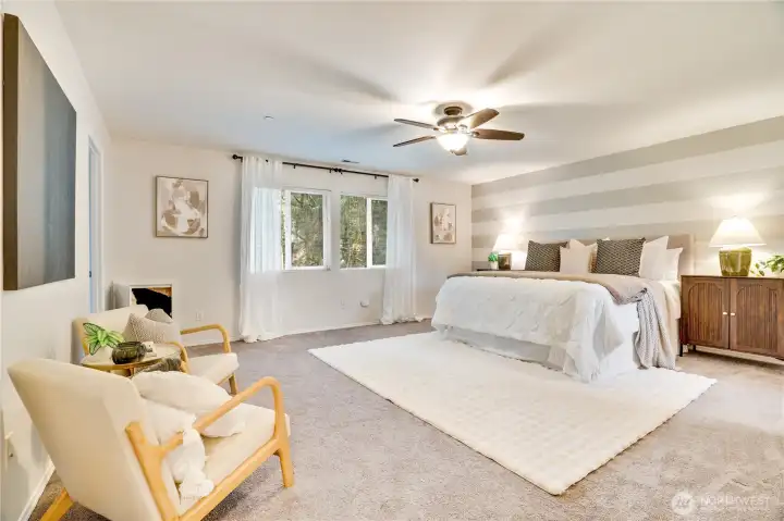 Primary room is incredibly spacious, has full walk-in closet, overlooks the backyard and has a 5 piece attached bath.