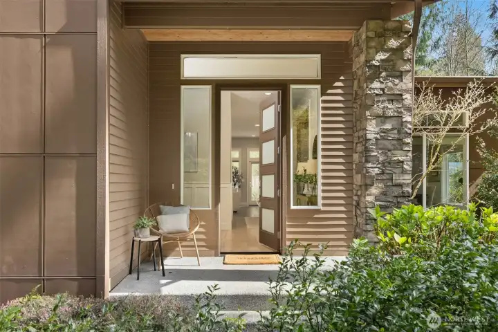 Crisp architectural lines, expansive windows, and curated greenery showcase the quality and care that make this home truly stand out.