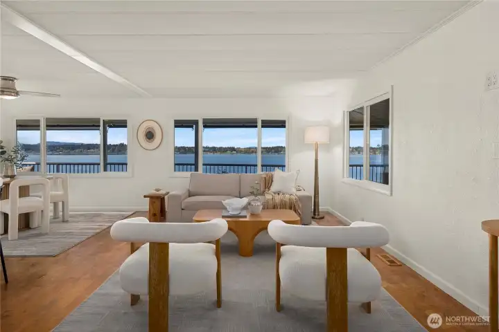 Spacious and inviting, the living area offers the perfect setting to relax or gather, with an easy flow that complements the home’s open-concept design.