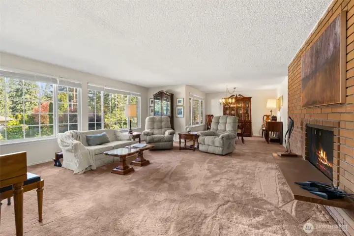 The living room can handle all your big furniture. The fire shown here is virtually enhanced