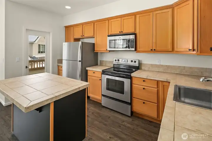 Easy love and cook kitchen with a spacious island for all your cooking needs.