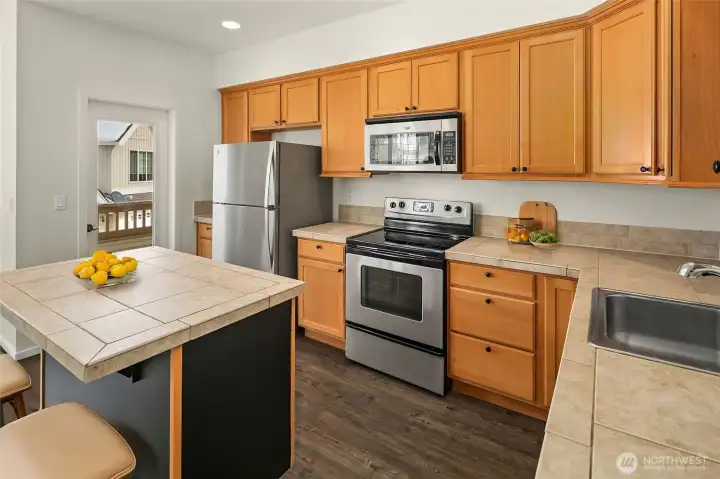 Has a covered outdoor patio area for fresh mountain air and to grow your own herbs.