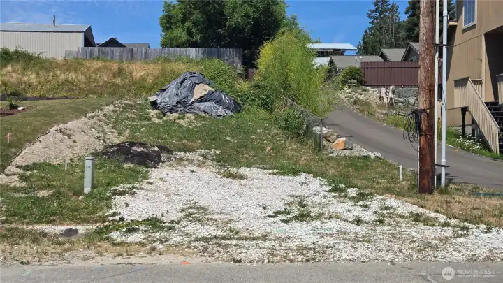 Roughed in driveway area for buyer to create finished grade based on building plans