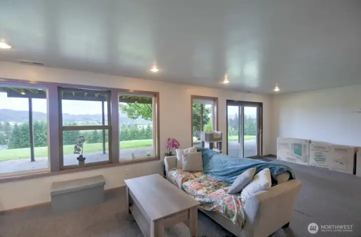 Basement living area with lower entrance Basement living area with lower entrance