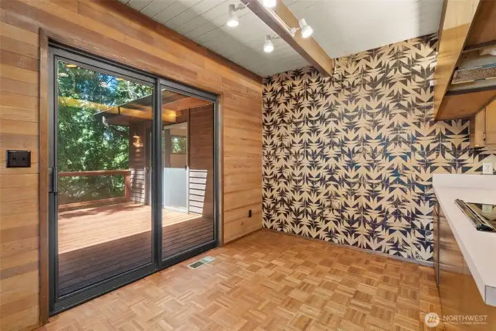 Dining room with slider to the deck.