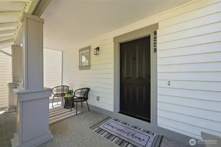 A warm welcome starts at the covered front porch. A perfect place for morning coffee or reading