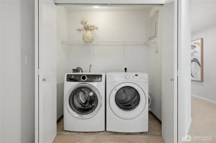 Upper level laundry area.
