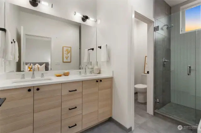Photos of Model Home in the same project.  Dual Vanity Primary Bath with Walk in Shower.