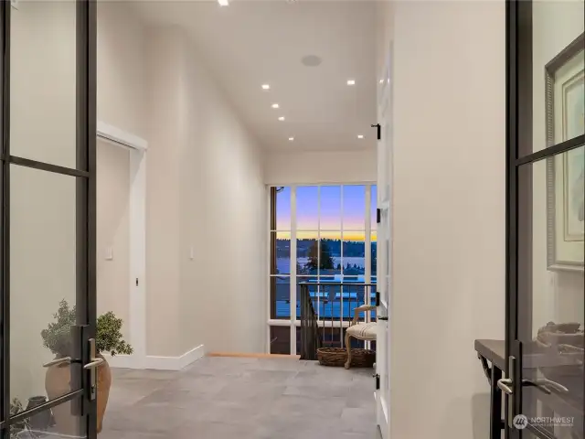 The appointments are impeccable: custom Loewen windows and doors, state-of-the-art Lutron LED lighting, a floating staircase, and smart home management system.